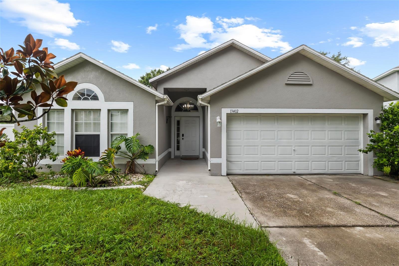 Beautifully maintained 3BR/2BA home in desirable Boyette Creek! Featuring nearly 1,900 sq. ft., this property offers two spacious living areas, vaulted ceilings, and an open floor plan. Recent updates include a new roof (2018), A/C (2020), and water heater (2021). The master suite boasts a walk-in closet, garden tub, and separate shower. Tile and laminate flooring throughout—no carpet! Situated on a quiet cul-de-sac with a large backyard, low HOA fees, and no CDD. Conveniently located near I-75, Hwy 301, and the Selmon Expressway with quick access to shopping, dining, and Downtown Tampa. Move-in ready—schedule your showing today!