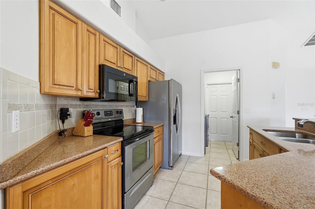 Photo of 2408 SW 53rd Street, Cape Coral, FL 33914 (MLS # TB8541842)
