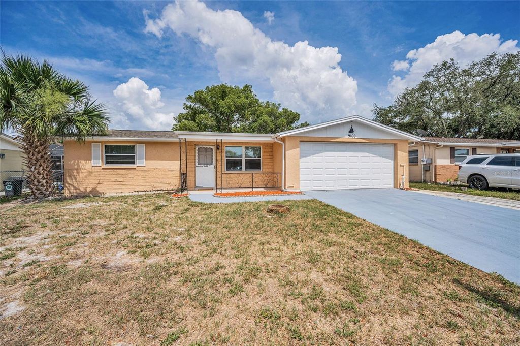 Photo of 9100 Lunar Lane, Port Richey, FL 34668 (MLS # TB8392203)