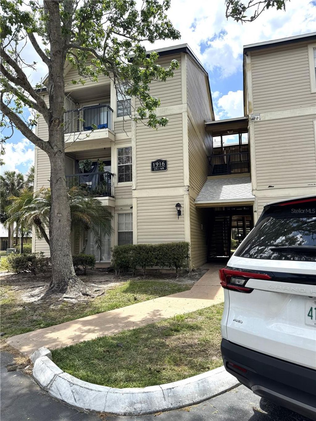 Photo of 1916 Lake Atriums Circle #32, Orlando, FL 32839 (MLS # O6402407)