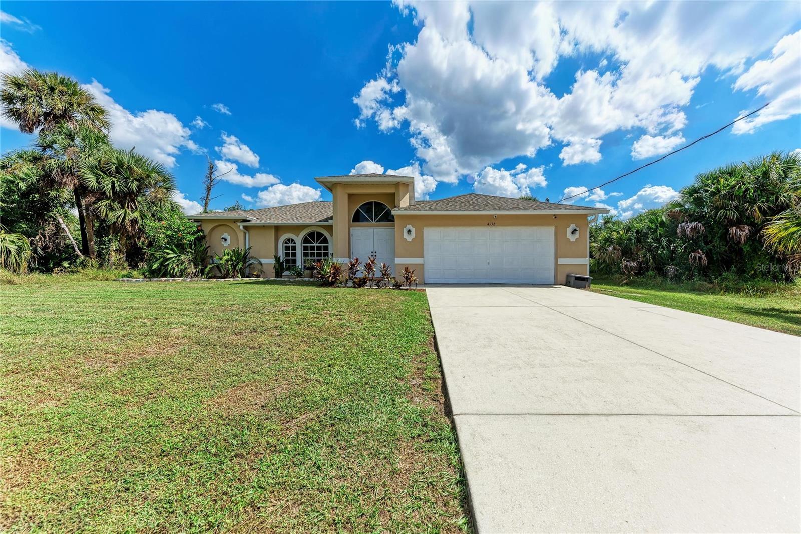 Welcome to this spacious 3-bedroom, 2-bathroom home, located in the heart of North Port — one of Southwest Florida’s fastest-growing and most desirable communities. Built in 2006, this beautiful home offers 1,873 square feet of living space and a thoughtfully designed split floor plan that combines functionality with comfort. With a new roof in 2023 and a new water heater in 2025, you will have many years of peace of mind. As you step inside through the double entry doors, you’re greeted by an open and airy living area with vaulted ceilings and plenty of natural light. The formal living and dining rooms offer flexible space for entertaining, while the large family room flows seamlessly into the kitchen and casual dining area — perfect for everyday living. The kitchen features plenty of cabinetry, a breakfast bar, and a full appliance package, making meal prep a breeze. Just off the main living area, the spacious primary suite offers a peaceful retreat with dual walk-in closets and a private bath, complete with a large walk-in shower. Two additional bedrooms are located on the opposite side of the home, providing privacy for guests or family members. A second full bathroom and a dedicated indoor laundry room add to the home’s convenience. Step outside through sliding glass doors to your covered lanai, perfect for relaxing or entertaining. The backyard offers ample space for a future pool, garden, or play area. Additional features include a 6 ft. privacy fence, 2-car garage, tile and laminate flooring, and hurricane shutters. Keep in mind, there are no HOA fees and more importantly, no flood insurance because this home is in an X flood zone. Conveniently located close to I-75, top-rated schools, shopping, dining, parks, and Wellen Park and Cool Today Park, this home offers the best of Florida living with room to grow. Bring your personal touch and make this home your very own. Priced to sell quickly so call to schedule your private tour today!