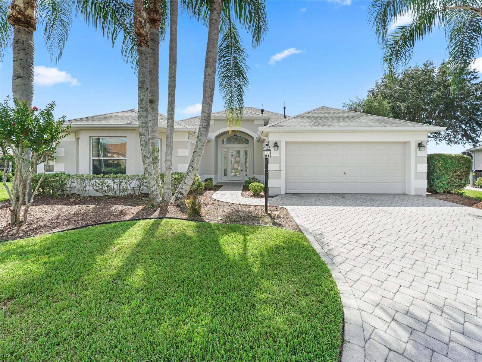 RENT BEFORE YOU BUY!!! Located in the Village of Chatham, this 3-bedroom, 2-bathroom home includes a golf cart and features an open floor plan with modern finishes and no carpet. The dining room seats six, and the living room has a Smart TV. The kitchen is fully equipped and sits next to the laundry room for added convenience. The master bedroom includes a king-size bed and Smart TV, with an ensuite bathroom featuring a jetted tub, walk-in shower, double sinks, and a private toilet room. Two guest bedrooms have queen-size beds and share a bathroom with a walk-in tub and shower option. Outside, the large lanai includes bar seating and a swim spa. The landscaped backyard offers privacy and a quiet space to relax. Nearby, you're minutes from Nancy Lopez Championship Golf Course & Country Club. Spanish Springs and Lake Sumter Landing feature nightly live entertainment and happy hour.
July-October: $5115/month | November: $4950 | December: $5115 (all plus taxes & fees) PLEASE CALL FOR PEAK SEASON(JAN-MAR) & WEEKLY RATES