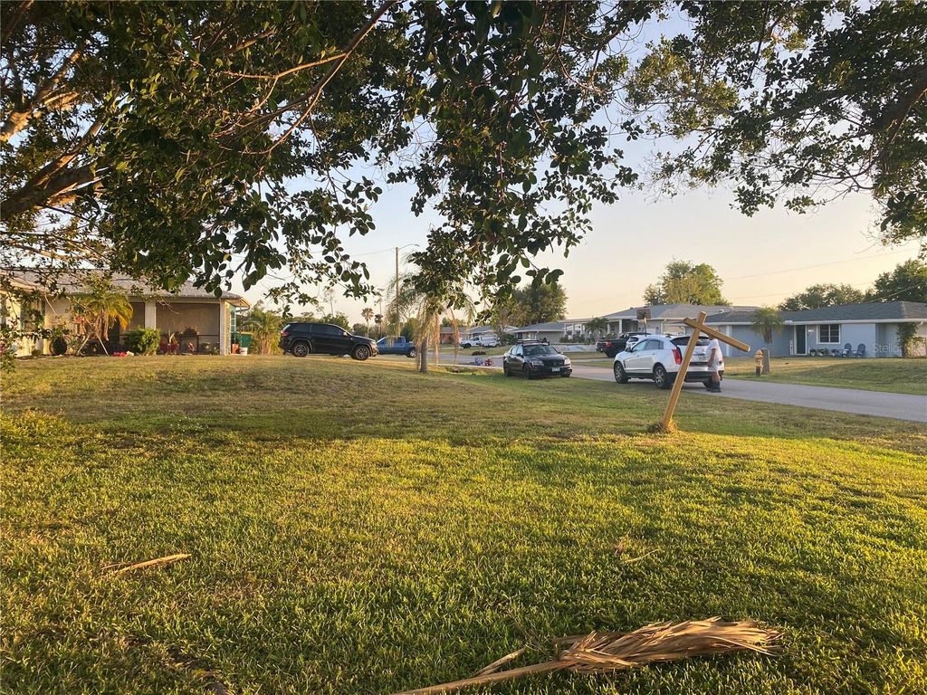 Photo of 543 Azalea Drive NW, Port Charlotte, FL 33952 (MLS # C7507774)