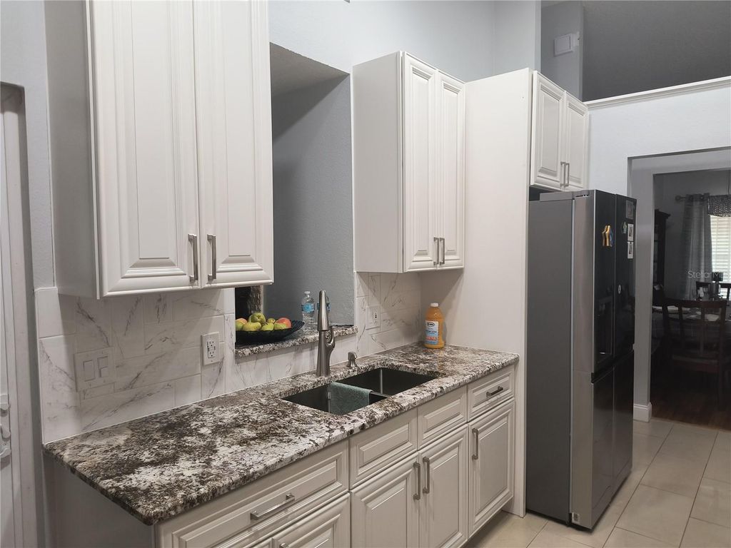 Photo of 3122 Pell Mell Drive, Orlando, FL 32818 (MLS # O6353560)