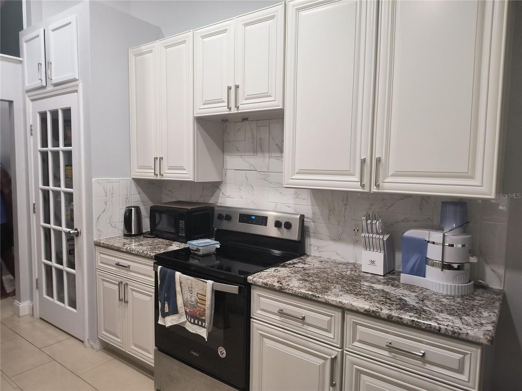 Photo of 3122 Pell Mell Drive, Orlando, FL 32818 (MLS # O6353560)