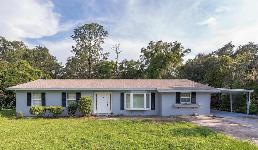 This wonderful 3 bed 2 bath pool home is located in heart of Brooksville just off of Downtown.  Easy access to shops, restaurants, etc.  New luxury vinyl plank flooring throughout.  Fresh coat of paint.   Enjoy a beautiful open kitchen with new shaker cabinets, granite countertops, and stainless steel appliances.  New hardware and fixtures throughout.  Walk out back to large screened in porch with fireplace and built in bar that overlooks your private pool.  Home sits on nearly 1/2 acre lot and has a huge detached shed/workpace for additional storage.  Washer/dryer convey as well.  Come see this home today, you'll love what it has to offer!