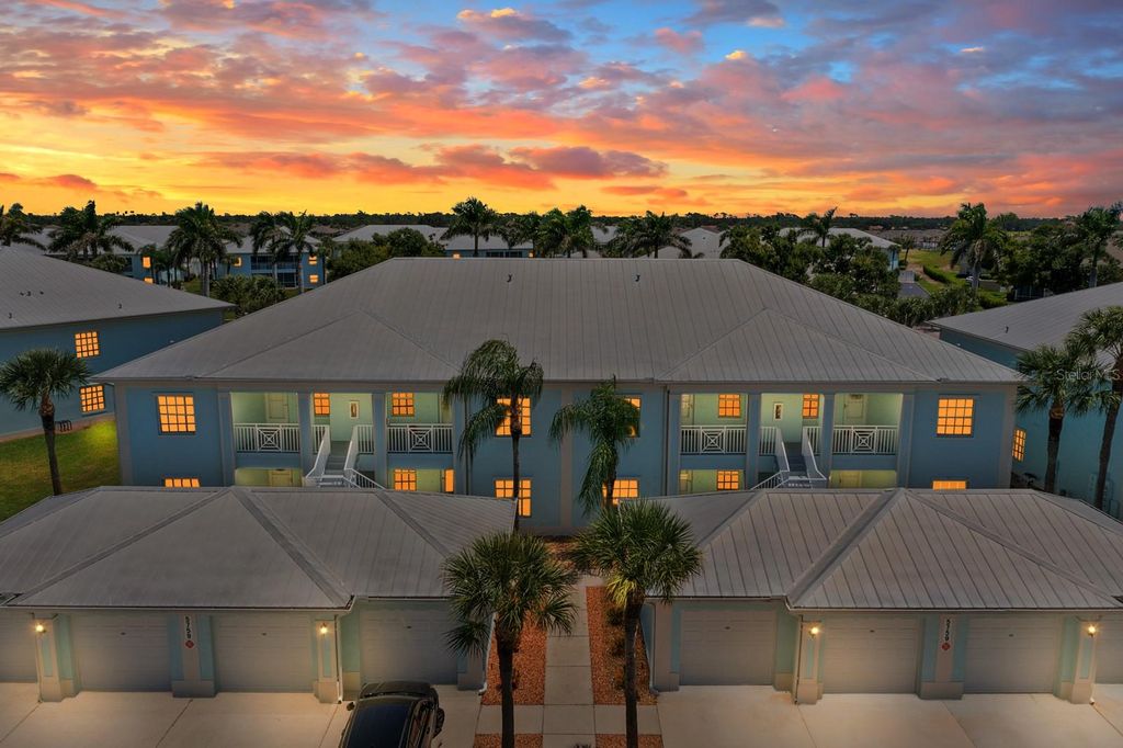 Photo of 5759 Sabal Trace Drive #104, North Port, FL 34287 (MLS # TB8418051)