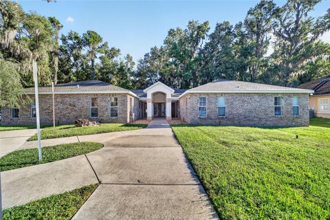Photo of 1315 SE 25th Loop, Ocala, FL 34471 (MLS # OM732816)
