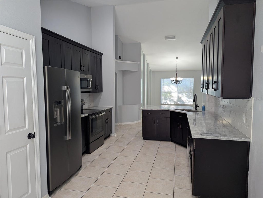 Photo of 6907 Freeport Road, Riverview, FL 33578 (MLS # TB8560409)