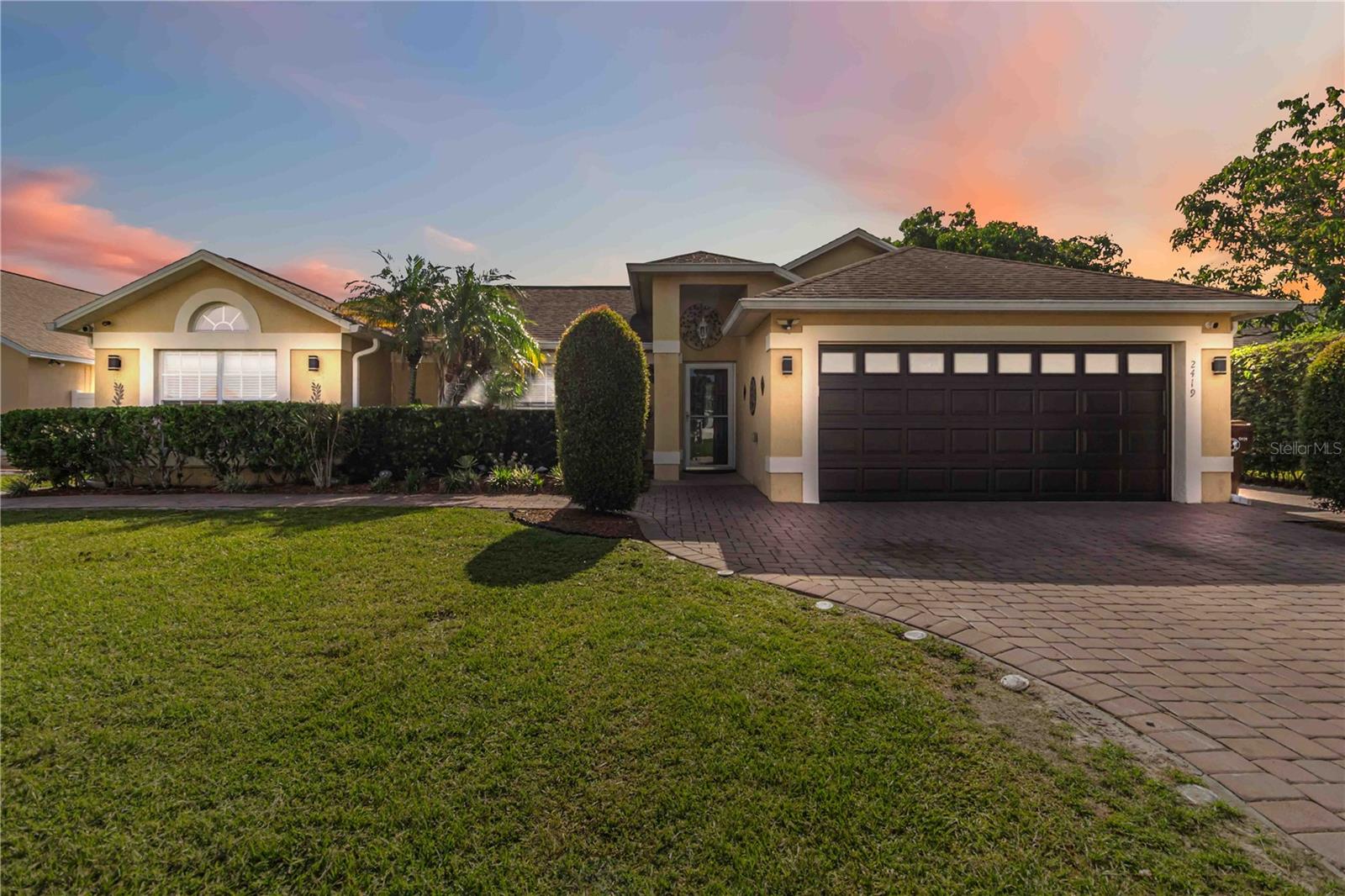 Experience modern Florida living in this spacious 4-bedroom, 2-bath home with dedicated office, tucked away on a quiet Kissimmee
street. The split floor plan ensures privacy while keeping gathering spaces open and connected. A stylish modern kitchen flows
effortlessly into the living and dining areas, perfect for hosting friends or enjoying family meals.
Outdoors, paver walkways and driveway create an inviting arrival, while the backyard’s paver patio is ideal for morning coffee,
evening grilling, or weekend get togethers. The fully fenced yard offers both security and seclusion, with a storage shed for your
tools and hobbies.
Stay comfortable year-round with central heat and air plus energy-efficient mini-splits throughout the home. Wired for a security
video system, this property blends peace of mind with easy, low-maintenance living. Its quiet location is still just minutes from
shopping, dining, and commuter routes—making daily life both relaxed and convenient. 13 month Home Warranty included!
Motivated seller—bring your offer and start enjoying the Florida lifestyle today!