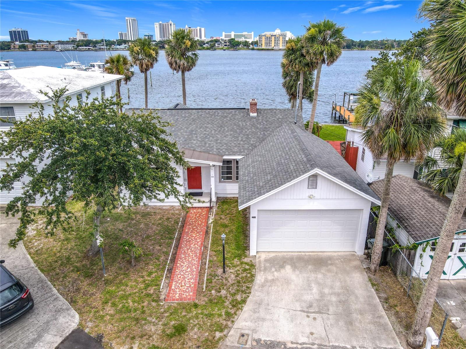 Location is everything! This charming 2 bedroom, 1.5 bathroom home sits on a deep water lot along the Intracoastal Waterway in the heart of Daytona Beach. Enjoy stunning waterfront views, perfect for entertaining by the fire pit. Just minutes from Riverfront Esplanade, Jackie Robinson Baseball Park, and all that downtown has to offer. A rare opportunity for waterfront living at its best!