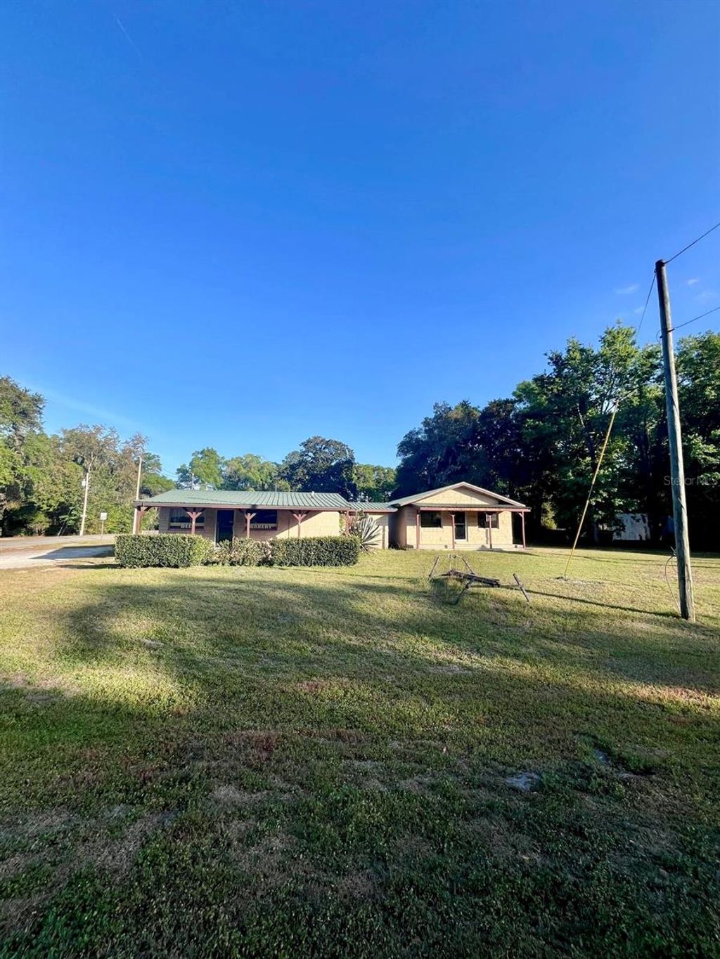 Photo of 7103 N Carl G Rose Highway, Hernando, FL 34442 (MLS # OM704315)