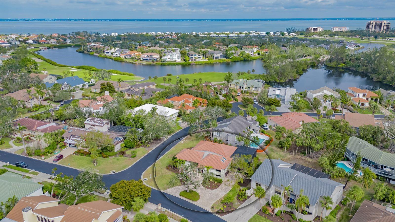 Immerse yourself in the timeless charm of West Indies-style living with this extraordinary residence, now offered in the coveted Bayou neighborhood, located behind the exclusive gates in the Bay Isles Community. Combining timeless finishes, thoughtful updates, and unparalleled value, this home is a rare opportunity to own a piece of island-inspired paradise. Even better, this home had no damage to the living area during recent storms. From the moment you step inside, the home exudes effortless sophistication. High ceilings, warm wood flooring, and abundant natural light create a welcoming atmosphere with an inviting flow. The kitchen is a masterpiece of both form and function, anchored by a striking granite waterfall center island. Custom built-ins, plenty of working counter space, stainless steel appliances and a convenient dumbwaiter elevate the space. The eat-in-kitchen area offers a casual, yet stylish setting for meals. A separate laundry room provides additional convenience ensuring every detail of daily living is addressed. Entertain with ease in the home’s versatile spaces. Host elegant dinners in the formal dining room, enjoy casual gatherings in the living room or take the party outdoors to the expansive covered lanai overlooking the pool. The private primary suite is a serene retreat, perfectly positioned for tranquility, offering an en-suite bathroom, double sinks, and two walk in closets. Featuring direct access to the lanai with beautiful views of the pool, you can easily step outside to your own tropical oasis. Second en-suite bedroom is nicely sized with built in office area. Third bedroom has vaulted ceilings and is tucked away ensuring privacy. The heated pool, surrounded by a paver pool deck, invites you to indulge in leisurely swims or soak up the Florida sunshine. The meticulously landscaped corner lot enhances the sense of privacy and serenity, while the full lower-level bonus area and oversized two-car garage provide ample space for storage or future customization. The Bayou is a lovely enclave offering a lifestyle of unmatched exclusivity and convenience. Just minutes from the Publix Shopping Plaza, The Longboat Key Country Club offering golf, tennis, marina, restaurants, and more, the upscale boutiques and dining of St. Armand’s Circle, and Sarasota’s vibrant cultural scene, everything you need is within easy reach. As a resident, enjoy privileged access to the Bay Isles Beach Club, where pristine sands and the sparkling Gulf of Mexico set the stage for endless relaxation. Seize the rare opportunity to own a fun West-Indies inspired home that blends timeless elegance with modern amenities - all at an exceptional value. Your Longboat Key dream awaits.