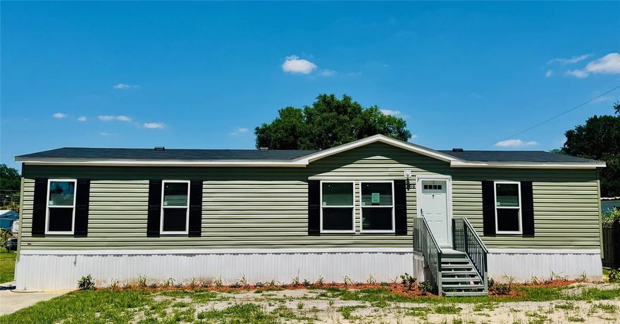 Welcome to your new home with this exceptional canal front home in sunny Central Florida! This beautiful brand-new 2025 mobile home is more than just a house it’s a place where memories are made, laughter is shared, and life unfolds in comfort and style. Step inside and feel right at home with a bright, open layout that’s perfect for gatherings big or small. The heart of the home is the spacious kitchen with a large island—perfect for morning pancakes, holiday baking, or late-night chats. The thoughtful split-bedroom design offers privacy for everyone, with three bedrooms, each featuring walk-in closets. The primary suite is your private retreat with a huge closet and a beautifully appointed en-suite bath, the perfect place to unwind after a long day. Outside, enjoy the patio out back for barbecues, sunsets, or weekend get-togethers. Your canal front lot connects to beautiful Lake Clearwater bring your boat, kayaks, jet skis, and water toys. Whether you're out fishing at sunrise or tubing on a sunny afternoon, lake life is right at your fingertips. Tucked away on a peaceful lot, near Four-Corners with the Disney parks, shopping, restaurants, and everything you need just minutes away and no HOA telling you what to do, this home offers the freedom and comfort you've been searching for. Whether you're starting fresh or settling down, this is a place where you can truly live, grow, and make lasting memories. Welcome home.