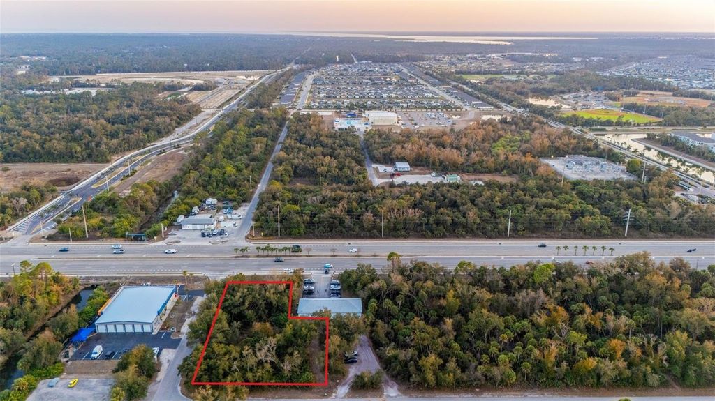 Photo of 732 Tamiami Trail, Port Charlotte, FL 33953 (MLS # C7521942)