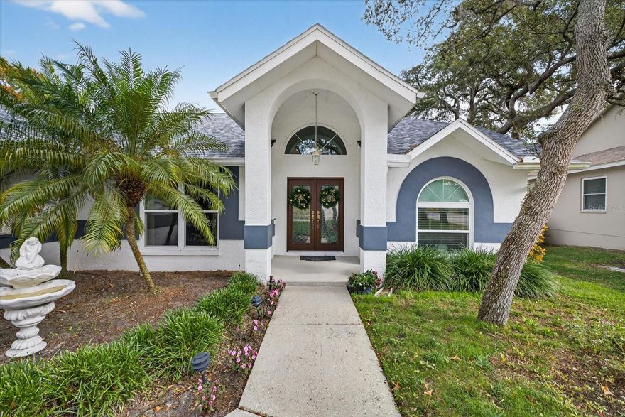 Immaculately kept and priced to sell in sought after Palm Harbor. Located in Glenbrook Estates, a highly desirable community where homes are rarely available, this 2,028 square foot move in ready home offers 3 bedrooms, 2 bathrooms, and a 2 car garage with a desirable split floor plan and high vaulted ceilings, creating an open and airy feel throughout. The property is in a current non flood zone and sits right next to Innisbrook Golf Course, offering easy accessibility throughout Pinellas County while maintaining a quiet, established neighborhood setting. All major ticket items have been done, providing true peace of mind for the next owner. The home features all hurricane impact windows installed in 2020, excluding two garage windows, along with an updated hurricane rated garage door in 2024. The roof was replaced in 2022, the AC is brand new in 2025, the hot water heater was replaced around 2021, and a water softener was added in 2024. Inside, the eat-in kitchen overlooks the great room and features granite countertops with wood cabinetry, making it ideal for both everyday living and entertaining. The open living and dining areas showcase wood flooring throughout, which continues into all bedrooms with no carpet anywhere in the home. The primary bathroom was fully renovated in 2024 and offers an abundance of granite countertop space with dual vanities, a walk-in shower, and a soaking tub, creating a true spa-like retreat. Designed for Florida living, this home is meant for outdoor entertaining and year round enjoyment. Situated on an oversized 0.46 acre lot, the property features covered outdoor living space with fans, an enclosed lanai, and a solar heated pool and spa with an insulated cover, allowing you to swim comfortably.Additional highlights include an inside laundry room and a low HOA of just $650 per year.All appliances convey! This home is in Pristine condition, thoughtfully updated, and move in, DO not let this pass you by! . Homes in Glenbrook Estates are rarely available and this Palm Harbor opportunity is priced to sell. Schedule your private showing today.