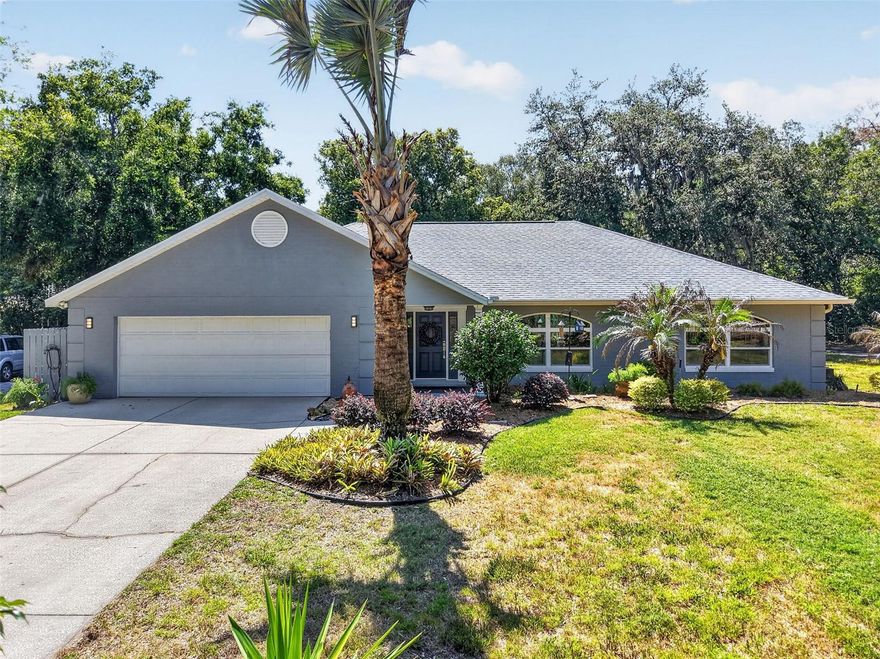 Welcome to this beautifully maintained home tucked away on a quiet cul-de-sac in the highly desirable Lake Joanna community of Eustis. Offering exclusive access to the private community lakefront on 320 acre spring fed Lake Joanna, residents enjoy a fenced grassy beach area, gazebo, boat launching ramp, enclosed boat storage, slips and a 160-foot dock perfect for boating, fishing, paddleboarding, or simply taking in peaceful sunset views.
Step inside and you are welcomed by a bright and inviting foyer that opens into the spacious main living area, where soaring ceilings, wood floors, abundant natural light, and a comfortable open flow immediately make the home feel warm and welcoming. The living room offers generous space for gathering and entertaining while overlooking the private backyard through large glass doors that bring the outdoors in.
Just beyond, the kitchen serves as the heart of the home with ample cabinetry, granite countertops, updated stainless steel appliances, gas range, center island with breakfast bar and a functional layout designed for both everyday living and entertaining. The adjoining dining area creates an easy flow for hosting family dinners or casual gatherings. Thoughtful upgrades throughout the home include a reverse osmosis water system at the kitchen sink and icemaker, along with a whole-house water filtration system for added comfort and convenience.
The primary suite provides a relaxing retreat with a spacious bedroom layout, and a private ensuite bath designed for comfort and privacy featuring dual sinks with granite countertops, walk in closet and walk in shower with dual shower heads. 
Additional bedrooms are generously sized and versatile, perfectly situated for family, guests, or a home office setup. The secondary bathroom is well-appointed and conveniently located to serve both guests and bedrooms alike.
The interior laundry room and ½ bath offers additional functionality and convenience, while the attached two-car garage includes a utility sink ideal for projects, cleanup, or extra storage needs.
 
One of the home’s most inviting features is the screened back porch, creating the perfect place to enjoy morning coffee, outdoor dining, or relaxing evenings while overlooking the fenced backyard. Over ½ acre lot and outdoor space offers plenty of room for pets, play, gardening, pool or future outdoor living enhancements, all while enjoying the privacy.
Additional practical features include a newer septic system approximately six years old, and a whole-house air scrubber purification system connected to the HVAC system for enhanced indoor air quality. The home also features leased solar panels that help keep electric bills remarkably low, offering energy efficiency and long-term savings.
Located just minutes from shopping, dining, and the charm of downtown Eustis and nearby Mount Dora, this home offers the perfect blend of comfort, convenience, and the Florida lake lifestyle in one exceptional community. Community boat storage fee $360/year. & 45/year for kayak. Boat slips are available first come, first serve. The "other " HOA fees is the potable water and irrigation which can vary. The TV and mount in the living room conveys.