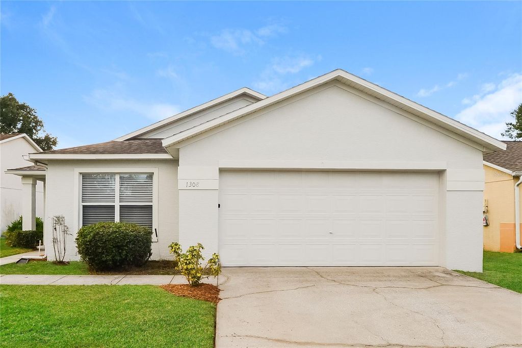 Photo of 1308 Whitewood Way, Clermont, FL 34714 (MLS # O6360019)