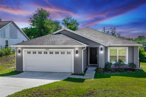 Photo of 1857 E Cooper Drive, Deltona, FL 32725 (MLS # O6308967)