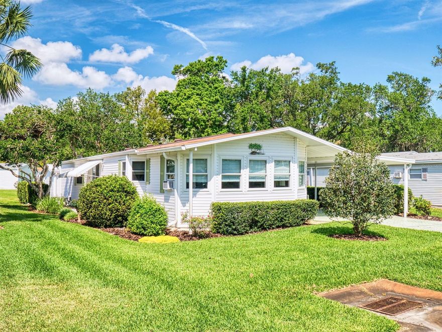 MOVE IN READY!  Outstanding decorated throughout with most furniture included (or seller will find a home for items you don't wish). However, I don't believe that will happen.  Painted beautifully. Ms. Clean lives here.    Owner has kept all records even paint chip samples.  Family room and Florida room were added.  Shed was where the Florida room is now.  Association gave approval for the extra large shed in the back.

Kitchen has a bay window, pass area window from kitchen to family room plus a built-in area for your computer. Pull out drawers and deep drawers in the kitchen  Living room has two eyebrow windows.  Master bedroom has built in closets galore.  Guest room has extra storage above the closet. This home has lots of storage,.   Painted driveway.

Roof 3/25/14, A/C 12/2015, replace polyethene plumbing  2/14, hot water heater 1/21, window air conditioner family room 5/22, invisible screen door 3/21, electric fireplace 9/18, driveway repaired PolyLift 9/20, paint and seal driveway 2/20, reinforce posts - driveway and front gable 9/17

Family and Florida rooms are part of the total square ft.  You own the land.

THIS IS A MUST SEE!

Edgewater Landing is such an active community that it is like resort living every day.  Fishing dock on the intracoastal, resident intracoastal boat ramp, heated pool, screened hot tub, tennis, pickleball, bocce, shuffleboard, bingo, many card games, Entertainment Committee, Boat and Fish Club, Women's Club, Quilting Club, line dancing lessons, chorus.  The list goes on and on.
Low HOA dues include platinum cable, internet,  One boat, or one RV outside storage is included when available. ;Water: City