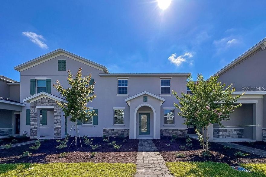 Refresh your lifestyle with this magnificent two-story townhome offering three bedrooms, two and one-half bathrooms, and a two-car rear load garage. The front door opens to a spacious open-concept living and dining area, perfect for entertaining. A fully equipped kitchen flows seamlessly to an inviting patio, while the convenient laundry room includes washer and dryer. Upstairs, the master suite features a private bathroom and a roomy walk-in closet. Modern finishes include quartz countertops, blinds, and all appliances, plus smart home features such as keyless door locks and video doorbells. This move-in ready home for rent is located in Storey Park, Lake Nona widely recognized as one of Orlando’s best communities to live in. Residents enjoy resort-style amenities including a resort pool, lap pool, splash pad, Jacuzzi spa, state-of-the-art fitness center, food pavilion, tennis courts, a large playing field for football or soccer, walking trails, dog park, and more. All of this is complemented by A-rated schools and a prime location in Orlando’s fastest-growing, most sought-after area. Nearby attractions include Nona Adventure Park, Boxi Park, Canvas Restaurant & Market, and the Lake Nona Sculpture Garden, making this one of Orlando’s most sought-after communities to call home.