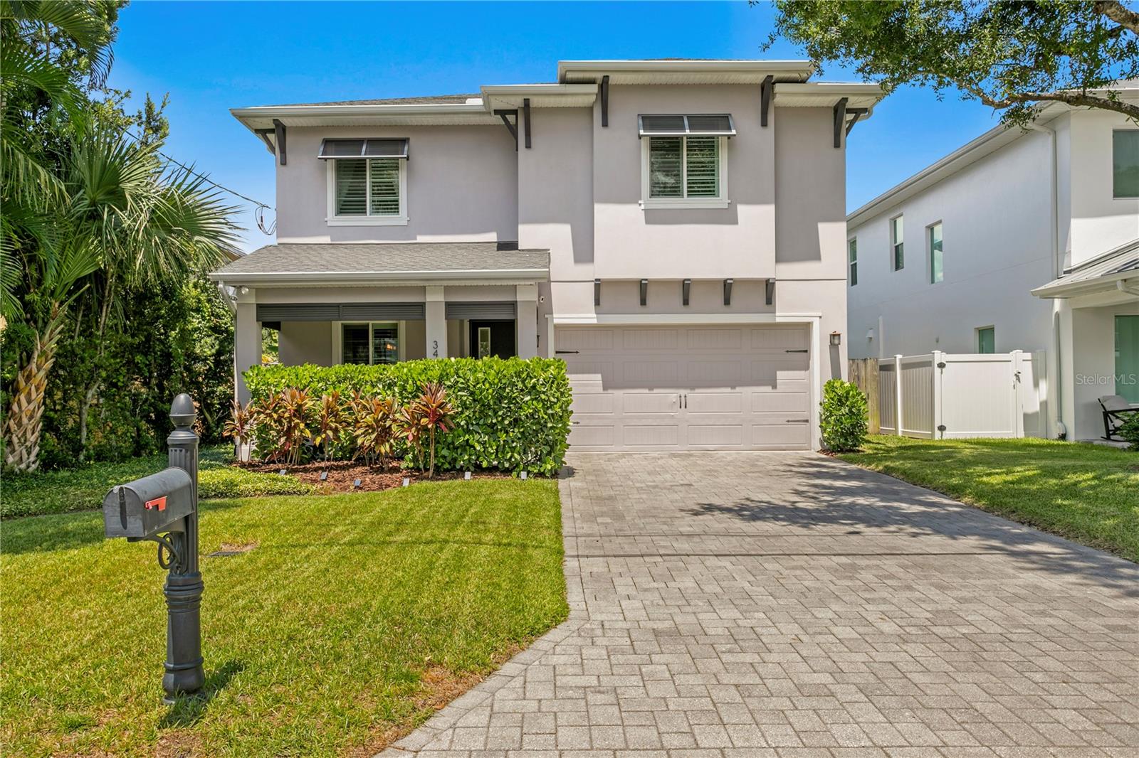 Discover Your Private Paradise in Palma Ceia Park! Step into this beautifully maintained TB home in South Tampa home where thoughtful design meets modern luxury. Tucked away in a serene, family-friendly neighborhood, the backyard is your own private retreat, surrounded by lush tropical trees and vibrant landscaping—perfect for relaxing, entertaining, or simply enjoying peace and privacy. And for added peace of mind, the home is not located in a flood zone. Built in 2016, this stunning residence features 5 bedrooms, 3.5 baths, soaring 10’ ceilings, 8’ doors, hurricane-impact windows, plantation shutters, and elegant crown molding. Every detail has been meticulously cared for by the current owners, with upgrades that elevate both style and function. Highlights include a newly sealed brick-paved pool deck, a heated saltwater pool with a waterfall feature, pet-grade turf, updated fans and lighting, a new shed, and full Google Smart Home integration for modern convenience. Inside, wide-plank European oak hardwood floors and custom black iron staircase railings create a warm, sophisticated atmosphere. The open-concept chef’s kitchen is a dream, boasting a 9’ island, quartz countertops, Viking stainless steel appliances, a gas range, farm sink, stacked shaker cabinetry with dovetail/soft-close drawers, and a butler’s pantry with sink and wine fridge. The luxurious primary suite features dual walk-in closets with built-ins, a spa-inspired bath with a free-standing tub, a frameless glass shower with a rain head, dual vanities, and designer fixtures. Secondary baths impress with quartz counters and stylish fixtures. Step outside to your private oasis: a screened lanai, custom outdoor kitchen with concrete counters, child-safety fence, and fully fenced backyard. The saltwater pool is heated with natural gas, making it perfect year-round, and the tropical landscaping creates unmatched privacy while still being conveniently located. Just a short walk to Roosevelt Elementary school, Buddy Brew, chill bros, Starbucks, and Bayshore Blvd. Move-in ready and truly turnkey, this home offers the ultimate in South Tampa lifestyle—privacy, elegance, and convenience all in one exceptional package. Copy and paste this link to tour the home virtually: my.matterport.com/show/?m=tH55DKo1U9m&mls=1