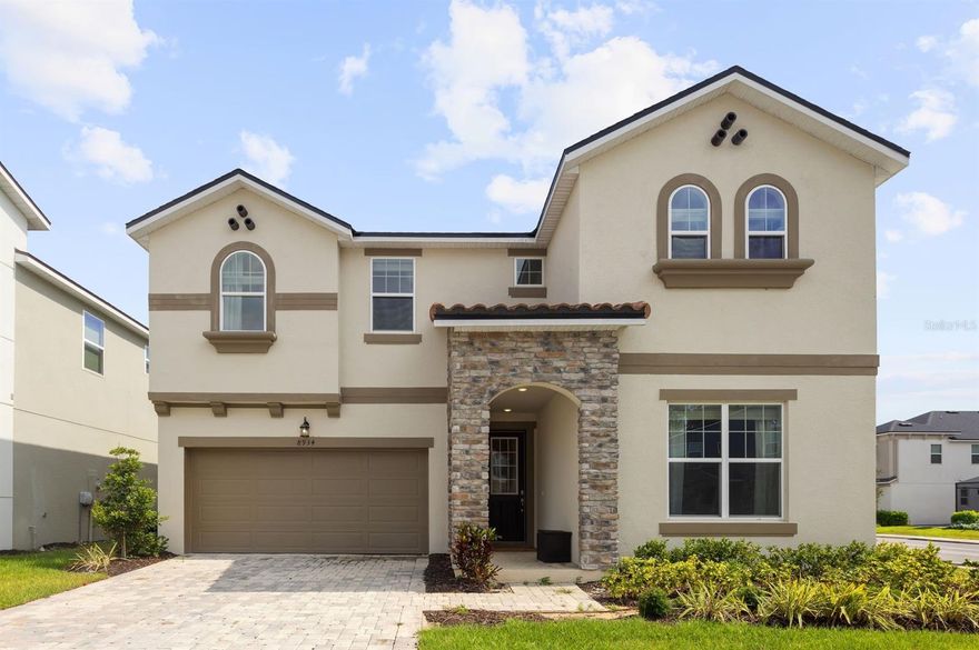 Welcome to your new home at 8934 Coconut Breeze Dr, Kissimmee, FL 34747, a 9-bedroom, 6.5-bath pool and spa home located in Phase 2 of Solara Resort, just steps from the clubhouse and resort amenities.

Built in 2022 and offered fully furnished, this luxury vacation home accommodates up to 25 guests, making it an ideal primary residence, second home, or high-performing short-term rental. The current owner has invested significantly in furnishings, décor, and overall presentation, creating a true turnkey opportunity ready for immediate use or income generation.

The home is designed with an open-concept floor plan that maximizes space and functionality, highlighted by two primary suites, including one conveniently located on the main floor. The kitchen is equipped with stainless steel appliances, granite countertops, and an oversized island with a double sink and ample seating, flowing seamlessly into the main living and dining areas.

Entertainment is built in, with a fully equipped game room featuring air hockey, foosball, a pool table, and an Xbox, along with themed bedrooms designed to enhance the guest experience. Step outside to an extended lanai with a private pool and spa, offering a spacious outdoor setting for relaxing or entertaining.

Located in one of Central Florida’s most sought-after resort communities, Solara offers resort-style amenities including a clubhouse, restaurant and coffee bar, zero-entry pool, fitness center, sports courts, splash pad, waterslides, FlowRider, and more—all just moments from your front door.

This is a well-positioned, move-in-ready property combining location, layout, and strong rental potential in the heart of the Orlando vacation market. Schedule your private showing today.
