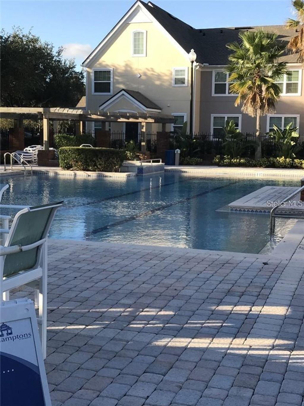 Photo of 6413 Astor Villages Ave #210, Orlando, FL 32835 (MLS # S5142201)