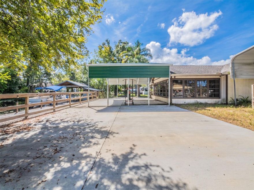 Waterfront Living in Astor!  2BR/2BA Canal Home with Dock + 2 car garage.  

Welcome to your slice of paradise in the peaceful riverfront community of Astor, FL.  This charming 2-bedroom, 2 bathroom single-family home offers the perfect blend of comfort, functionality and Florida lifestyle.

Nestled on a canal with direct access to the St. Johns River, the home boasts 1424 sq ft of living space.  Boaters will love the private dock-repairs and replacement, completed in 2016-with room for vessels up to 37 feet.  Under one of the covered area which will accommodate an RV is equipped with a dedicated 30-amp hookup makes it easy to power to power your RV or boat.

The spacious concrete pad in the backyard is ideal for barbecues, entertaining or just relaxing by the water.  The roof was replaced in 2017, adding peace of mind for years to come.  New A/C compressor (3.5 ton-14 seer heat pump system).

This is a boat-friendly community, with easy access to some of Florida's scenic waterways with casual dining establishment on or off the water.

Inside you'll find find a bright and open layout with two comfortable bedrooms, two full baths and a 2-car garage for all your storage and parking needs.

Whether you're a full-time resident or looking for a weekend retreat, this home checks all the boxes for a true Florida waterfront lifestyle.  No HOA and plenty of room for your toys!

Call today to schedule your personal tour.