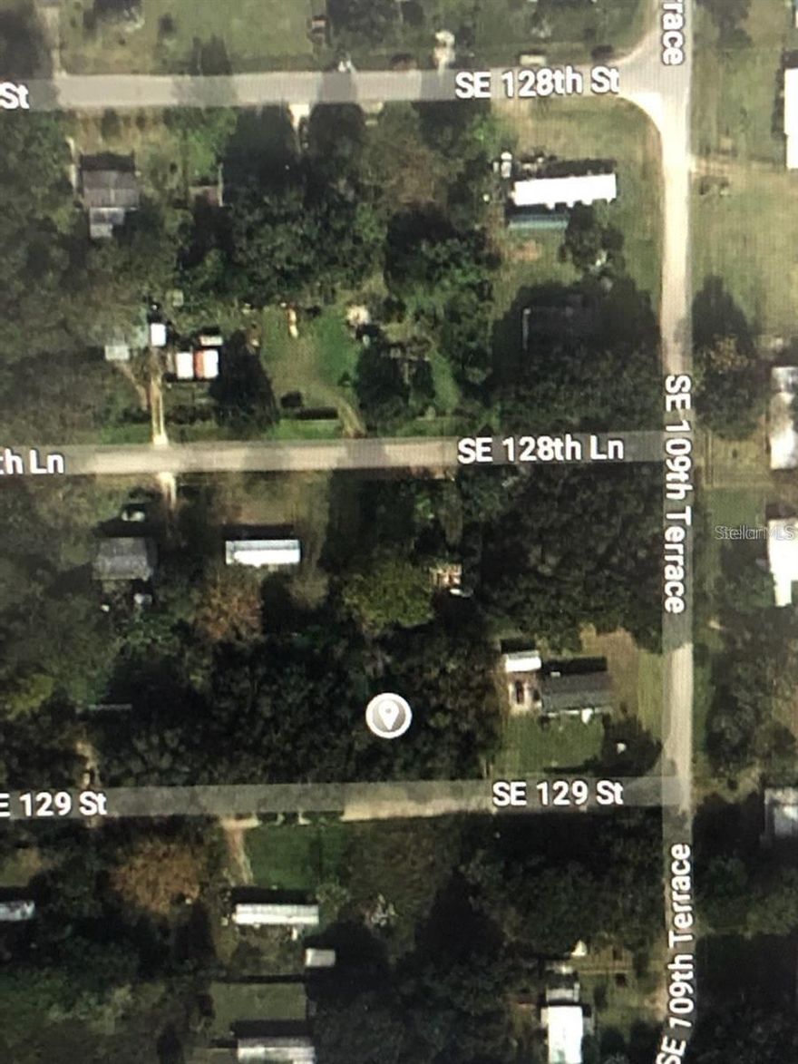 This is a very nice and affordable 0.23 acre Lot that is ready for you to build your New Dream Home on in the lovely and peaceful Lake Weir
Heights neighborhood. This lot is on unpaved County-maintained road. Property is zoned R4, which will allow you to put a self-contained RV or a mobile home on it until you build your dream home in this quiet country neighborhood with no HOA and a lovely neighbor living close by. Don't miss out on this lot, it's just waiting for you to build on!!