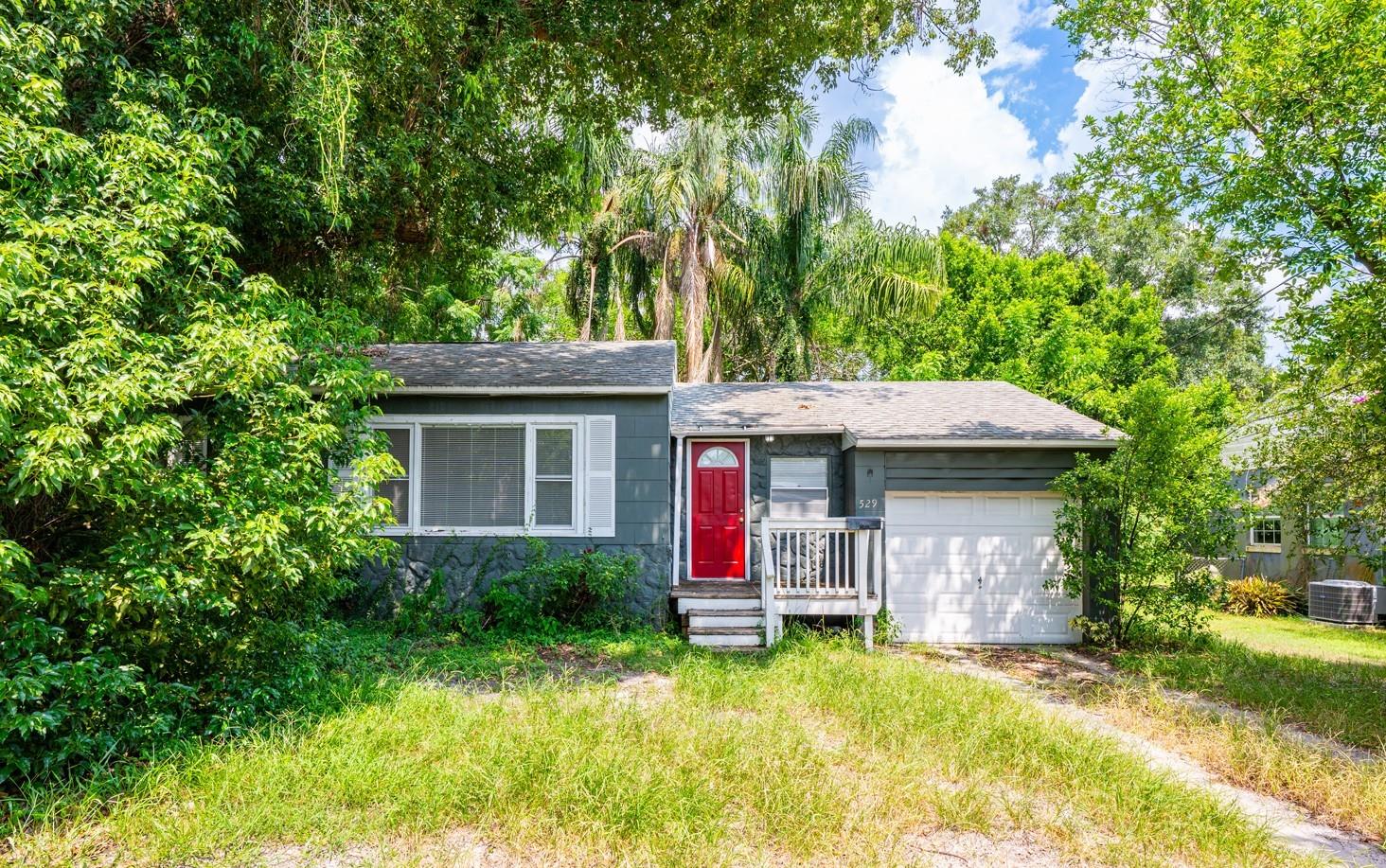 One or more photo(s) has been virtually staged. This property qualifies for a credit up to $4485 through the seller's preferred lender / Seller may consider buyer concessions if made in an offer ***Located just minutes from the heart of Downtown Orlando, this charming single story home offers a blend of character, modern updates, and unbeatable convenience! Whether you are in the market for a great INVESTMENT property, a flip OPPORTUNITY, or a cozy place to call home, this property delivers. Set on spacious .16 ACRE LOT and surrounded by MATURE TREES, this home feels peaceful while still putting you right in the center of everything. The interior features TILE & WOOD FLOORING throughout and large windows that bring in great natural light. The updated kitchen is both stylish and functional, with a breakfast bar passthrough connecting it to the dining area where a WOOD SLAT CEILING and French doors add architectural interest. The layout flows easily into the living area, creating a space that is both practical and full of charm. The exterior delivers room to relax, garden or entertain under the canopy of the trees. With easy access to SR 408, I-4, and Lake Underhill, commuting and exploring Orlando’s best spots is effortless. You are also not far from a variety of shopping, dining, parks, and recreation – and only minutes from the Orlando Executive Airport. Zoned for A-RATED SCHOOLS, this home offers both lifestyle and long-term value depending on your needs. Call today to schedule a tour and discover the possibilities!