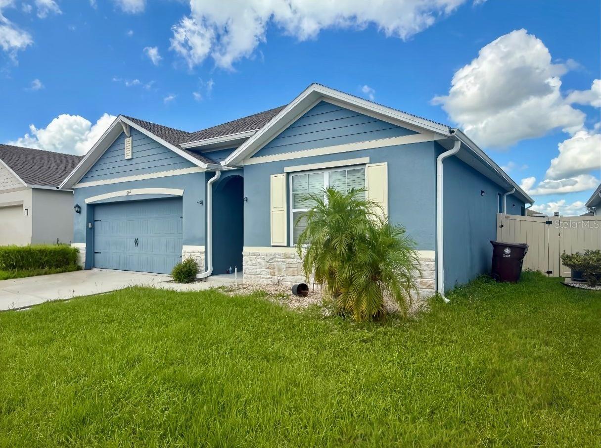 Located in Haines City, this 4-bedroom, 2-bath home offers a strategic location with easy access to Highway 27 and I-4. It is conveniently close to schools, hospitals, and shopping centers, providing excellent everyday convenience.
The property features a stone-accented façade and a fenced backyard with a concrete patio, ideal for outdoor activities and family gatherings.
Just minutes from Lake Eva Community Park, which offers sports courts, a swimming pool, walking trails, and playgrounds, and only 30–35 minutes from Walt Disney World, this home combines comfort, accessibility, and proximity to Central Florida’s top attractions.(Additional property photos coming soon.)