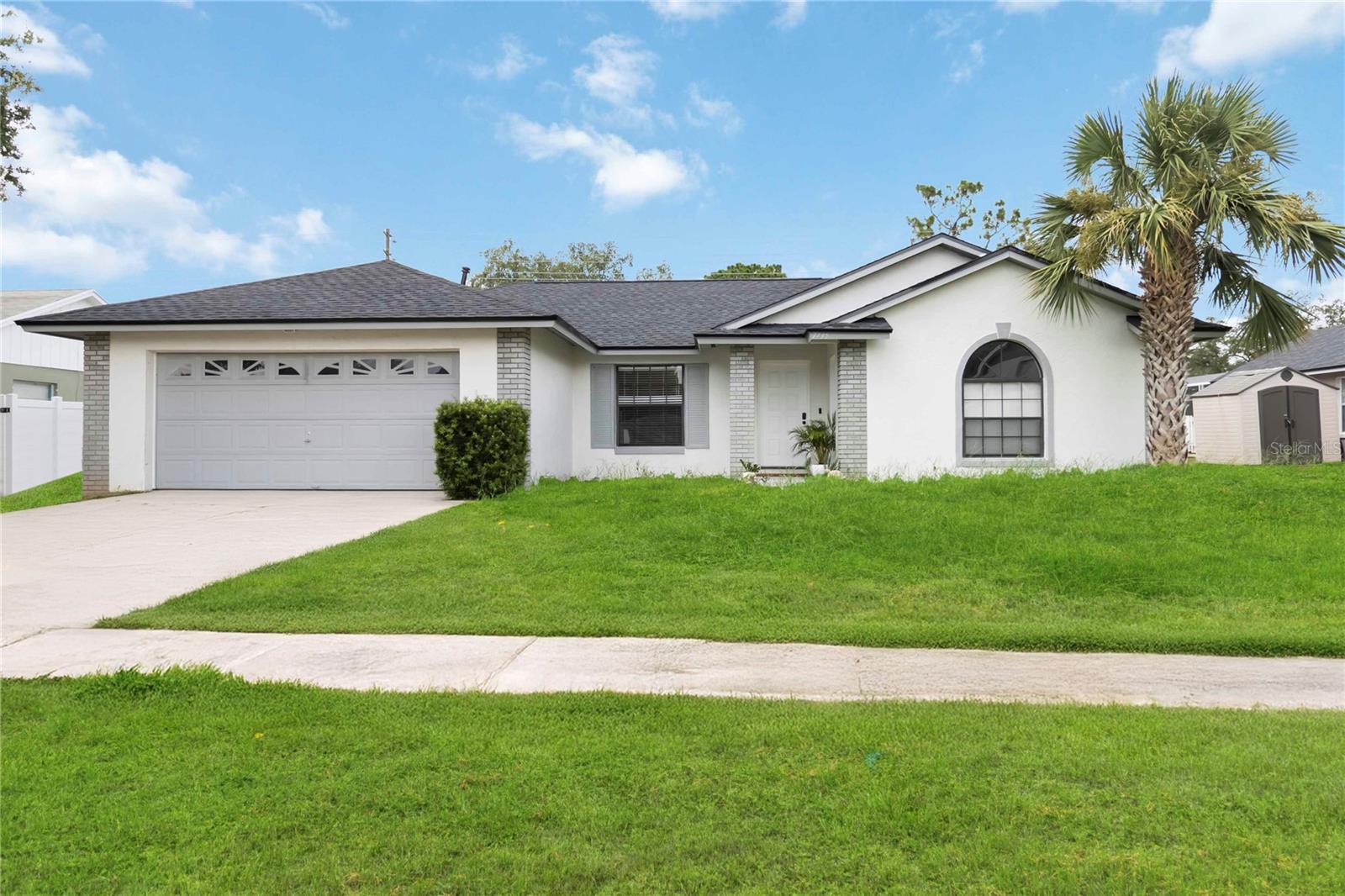 Welcome to 7735 Indian Ridge Trail N – a rare gem in the heart of Kissimmee that perfectly blends comfort, versatility, and opportunity. This spacious 5-bedroom, 3-bathroom pool home has been thoughtfully updated with a brand-new roof and A/C system, giving you peace of mind from day one. Just 10 minutes from the magic of Disney, this property offers unmatched convenience for families, vacationers, or investors. The flexible layout includes a private in-law suite with its own entrance—ideal for multigenerational living or as a high-performing short-term rental. Whether you’re housing extended family or building passive income, this setup works for both. Step inside to an open and airy living space designed for both entertaining and everyday living. The kitchen features ample cabinetry, generous counter space, and a seamless flow into the dining and living areas—perfect for hosting guests after a day at the parks. Outside, enjoy your own private screened-in pool area, ideal for relaxing weekends and summer nights. The oversized backyard offers room to grill, play, and unwind. As part of the desirable Indian Ridge community, residents enjoy access to a resort-style pool, tennis and basketball courts, soccer fields, scenic walking trails, and more—all with a low annual HOA fee and no short-term rental restrictions. Whether you’re looking for your forever home, a vacation retreat, or a turnkey investment near the world’s top attractions, this home checks every box. Schedule your private tour today and step into your next chapter!