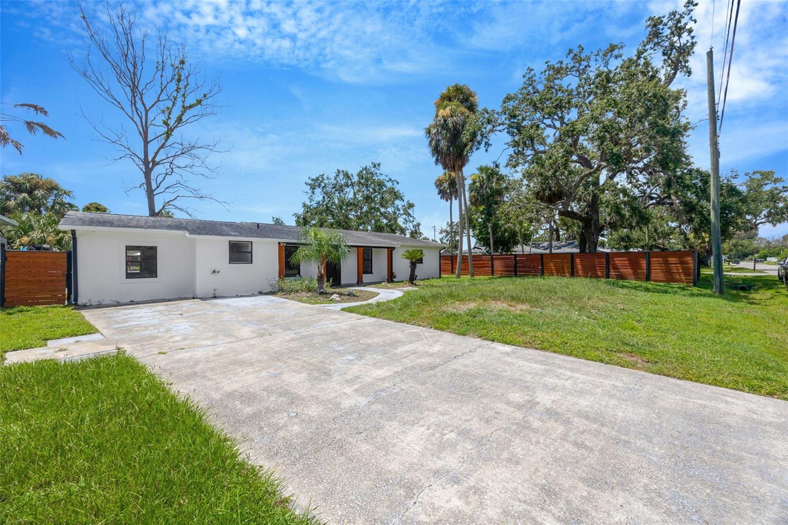 A Rare Find – Alafia River home! This fully renovated 3 bed 2 bath ranch style block home sits on a huge lot with waterfront access to the Alafia river and a short boat ride to Tampa Bay. Bring your boat, RV, & other fun toys ~ **No HOA or CDD** Conveniently located just minutes from I-75 and US-41, restaurants, shopping, & more - you can enjoy quiet living with quick access to all life’s needs! Savor the fully fence almost half acre lot featuring your own onsite kayak/paddleboard launch and covered dock with boat lift. The plumbing, electrical, and septic system were updated in 2018. New fence, fresh interior and exterior paint, newly renovated kitchen & bathroom, flooring, and more! **HVAC 2024** Relax with a cold drink or good book on the enclosed rear lanai overlooking the large backyard and canal. Located on a quiet dead-end street, this property is a peaceful slice of true Florida living. All the bedrooms are nicely sized with ample closet space. The easy flow between the kitchen, living room, family room, and outdoor lanai creates the perfect house for entertaining in everyday life or could serve as a great vacation getaway (Airbnb & rental income potential). The property has an assumable mortgage with a 4% interest rate. Schedule your showing today and come enjoy the Florida waterfront lifestyle!
