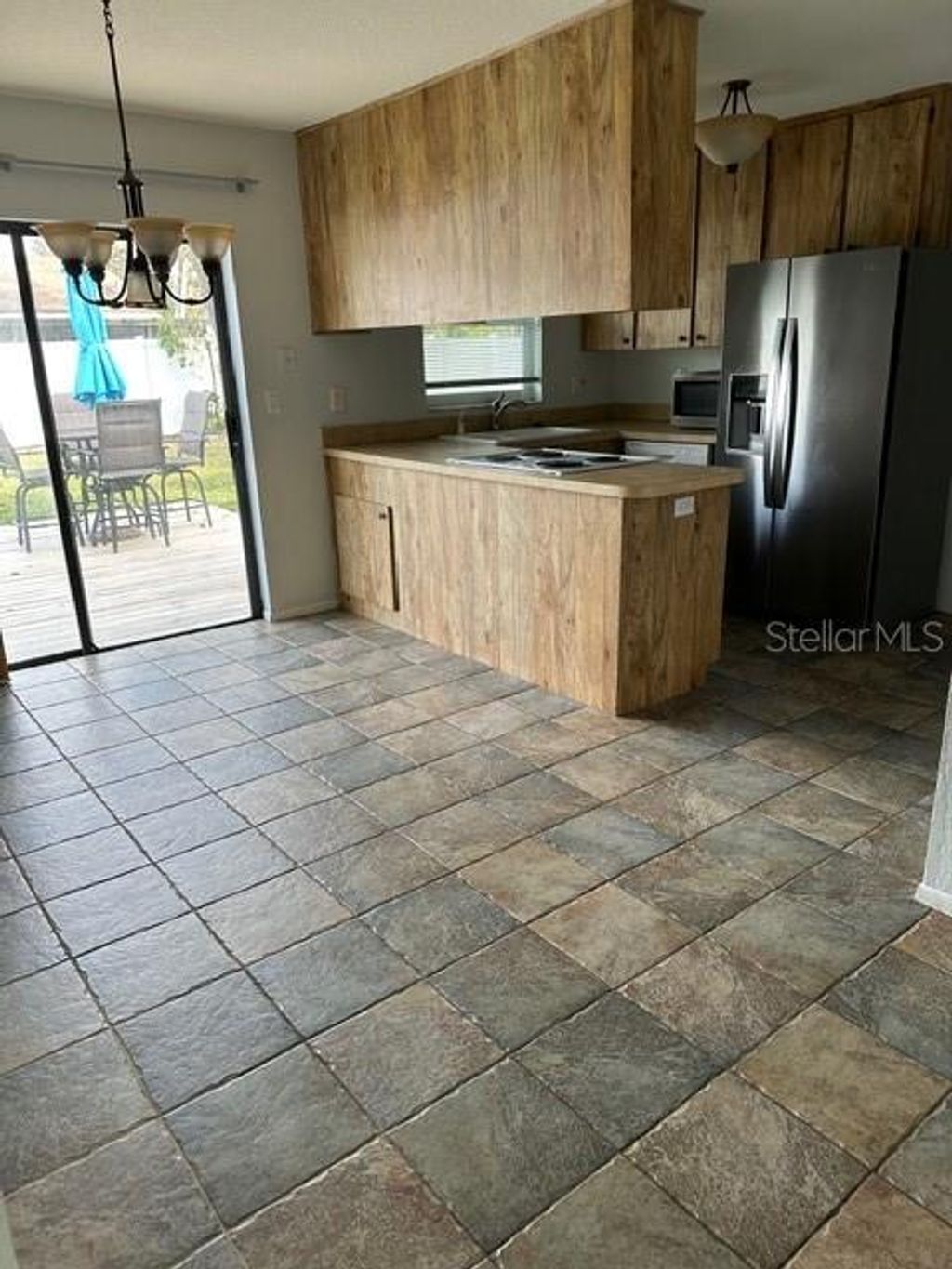 Photo of 3267 Marigold Drive, Clearwater, FL 33761 (MLS # TB8463290)