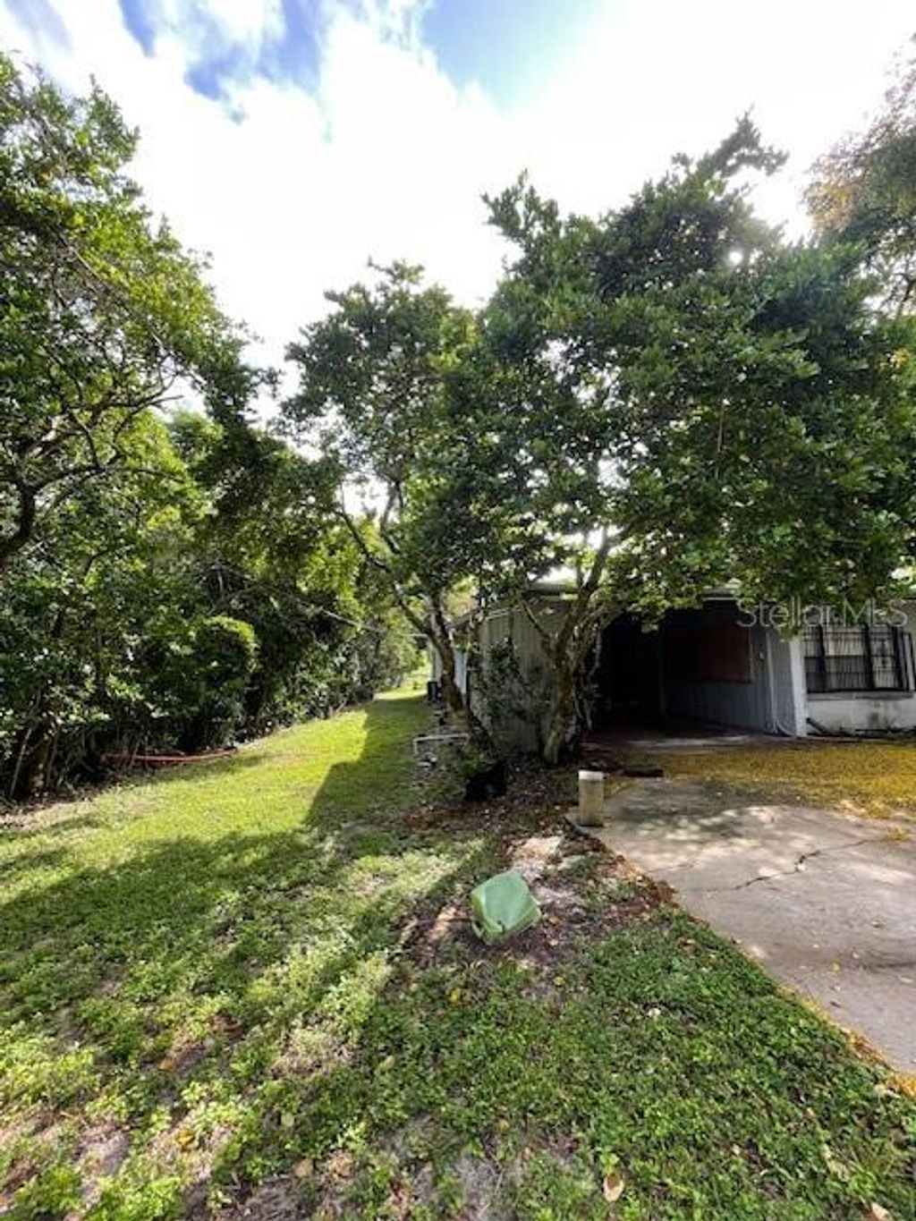 Photo of 7439 Mott Avenue, Orlando, FL 32810 (MLS # O6396480)