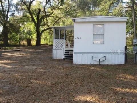 Photo of 6742 NW 62nd Avenue, Ocala, FL 34482 (MLS # OM732803)