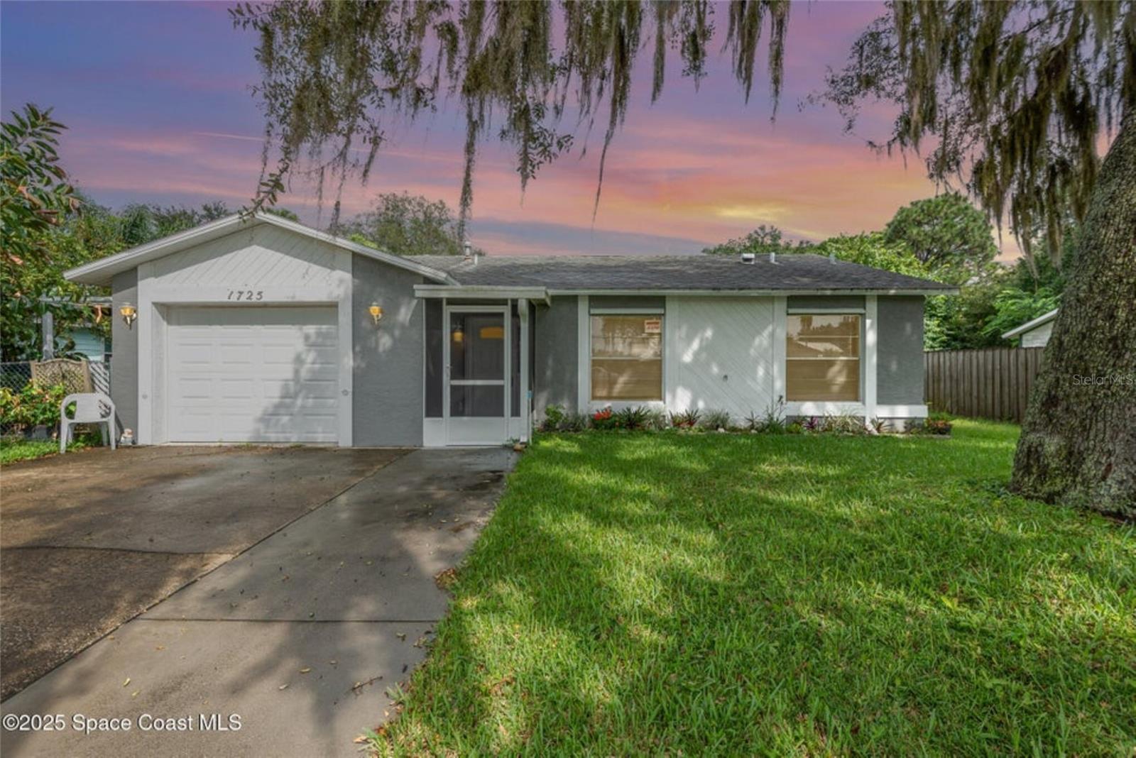 Fall in love with this cozy 2-bedroom, 2-bathroom home, filled with charm and character. Built in 1985 and offering 1,037 square feet of living space, this home features stainless steel appliances in the kitchen and a beautifully updated shower in the primary bathroom. Step outside to find a large screened back porch, perfect for entertaining friends and family. Cool off in the newer inviting saltwater pool or relax in the hot tub, or spend your weekends tinkering in the spacious workshop at the rear of the property. The home also includes hurricane shutters conveniently stored in the garage and home also features a brand new HVAC system. Currently rented until January 31, 2026, this property presents a fantastic opportunity for future homeowners or investors alike. Whether you're planning ahead for your dream home or seeking a solid investment, this one checks all the boxes!