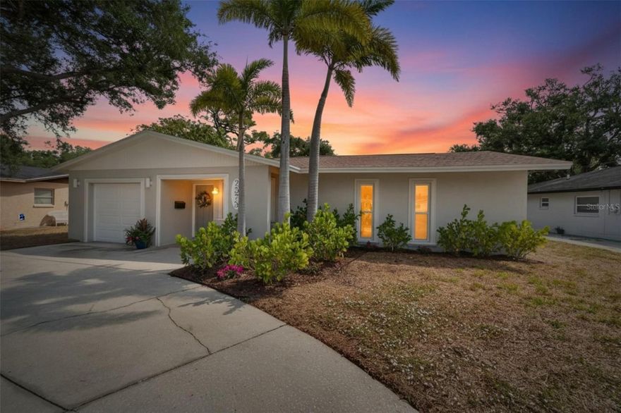 Welcome home to this beautifully updated 3-bedroom, 2-bath residence in the sought-after Lakewood Estates community. This beautiful home features an exceptional homesite spanning over a quarter of an acre, offering endless possibilities for outdoor living and entertaining. The expansive backyard provides ample space to create your dream outdoor oasis, with room for a swimming pool, pickleball court, and more. Thoughtfully redesigned with both comfort and entertaining in mind, this charming home offers a light-filled open-concept living and dining area creating the perfect setting for gatherings with family and friends. The stunning kitchen is a true showpiece, featuring brand-new quartz countertops, soft-close cabinetry, and stainless steel appliances. Just beyond the dining area, sliding doors lead to an oversized screened-in patio, seamlessly blending indoor and outdoor living and providing the ideal space to enjoy Florida living year-round. The spacious primary suite serves as a private retreat with a beautifully renovated en-suite bathroom, while two additional guest bedrooms and an updated full bath provide comfort and flexibility for family and visitors alike. Additional highlights include a generously sized garage with a new washer and dryer (2025), a new air conditioner and new duct work (2025), new water heater (2025) and a whole house premium water filtration system (2025) that provides the highest quality drinking water. This exceptional home combines modern updates, inviting living spaces, and an unbeatable location in one of the area’s most established neighborhoods. Located in a non-flood zone and just minutes from downtown St. Petersburg, beaches, and major conveniences, this home combines lifestyle, upgrades, and long-term potential in one compelling package. The nearby St. Petersburg Country Club provides premier golf, tennis, and social amenities. Beautiful Gulf beaches, Fort De Soto Park, boating, fishing, and waterfront recreation are all within easy reach, making it effortless to enjoy the Florida lifestyle year-round. Schedule your showing today!