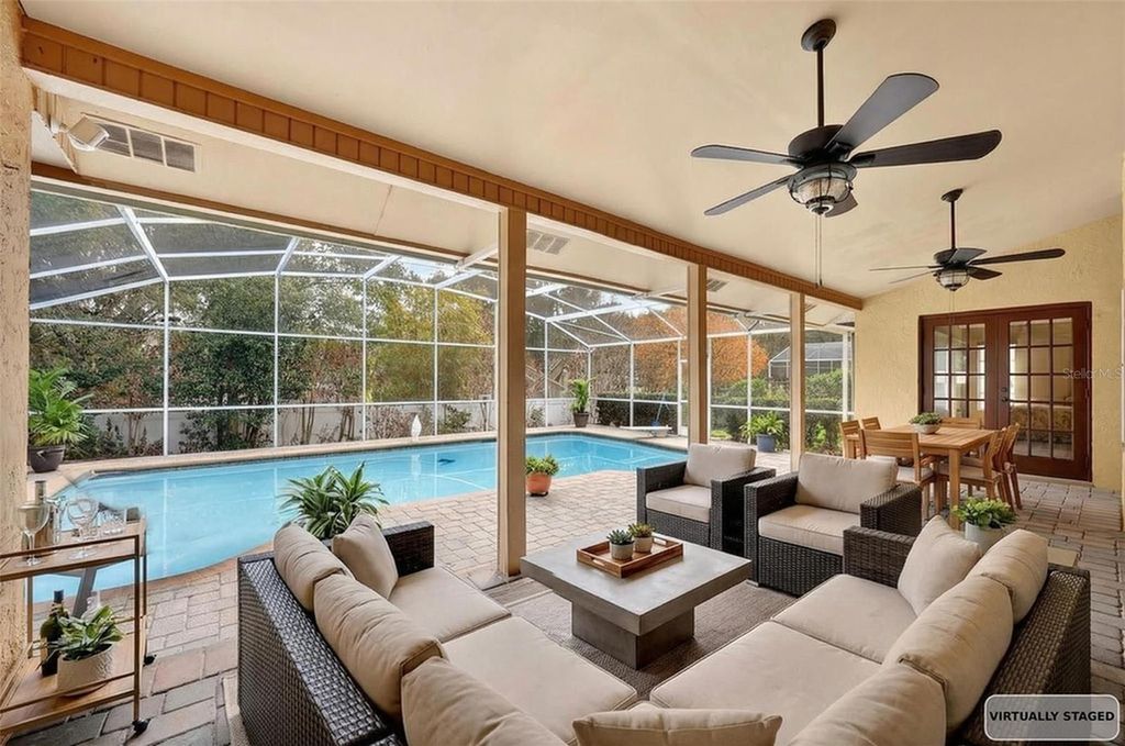 Photo of 4433 Winderwood Circle, Orlando, FL 32835 (MLS # O6391295)