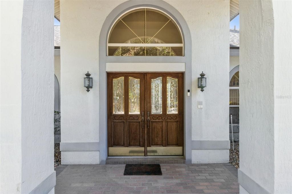 Photo of 2964 Plantation Road, Winter Haven, FL 33884 (MLS # O6352519)