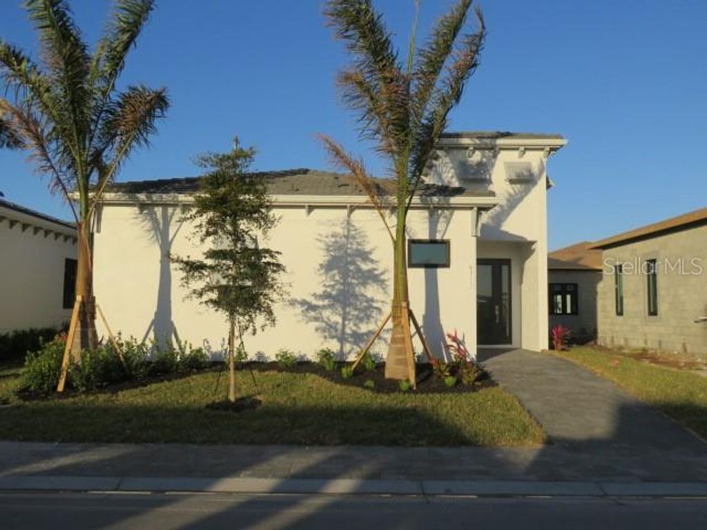 Photo of 6311 Pigeon Plum Way, Bradenton, FL 34210 (MLS # A4675513)