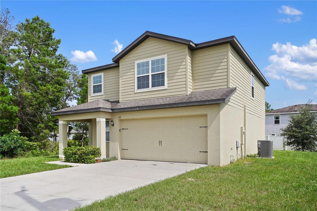 Photo of 216 Fig Court, Poinciana, FL 34759 (MLS # O6429893)