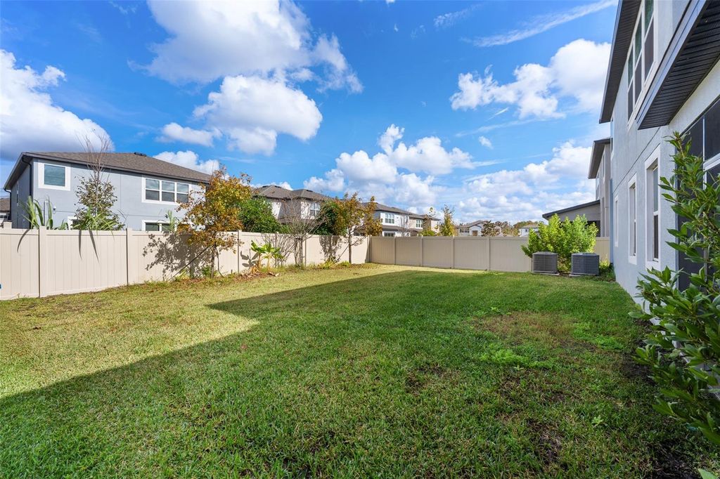 Photo of 33251 Sycamore Leaf Drive, Wesley Chapel, FL 33545 (MLS # TB8452274)