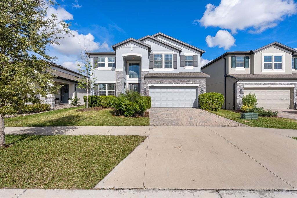 Photo of 33251 Sycamore Leaf Drive, Wesley Chapel, FL 33545 (MLS # TB8452274)