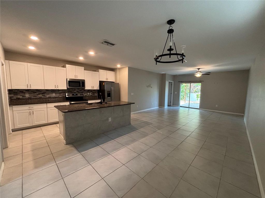 Photo of 572 Argyll Dr, Spring Hill, FL 34609 (MLS # TB8458269)