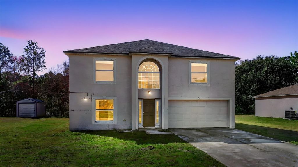 Photo of 22 Longfellow Drive, Palm Coast, FL 32137 (MLS # V4947282)