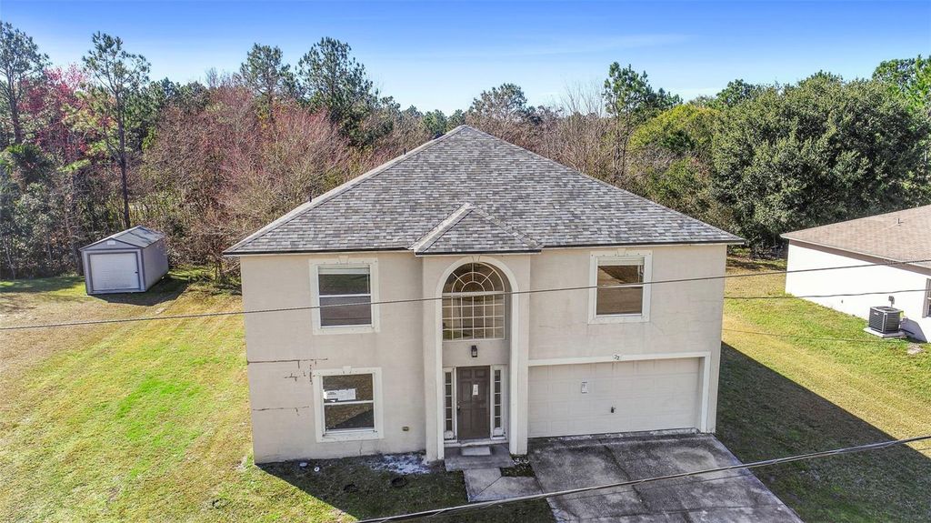 Photo of 22 Longfellow Drive, Palm Coast, FL 32137 (MLS # V4947282)