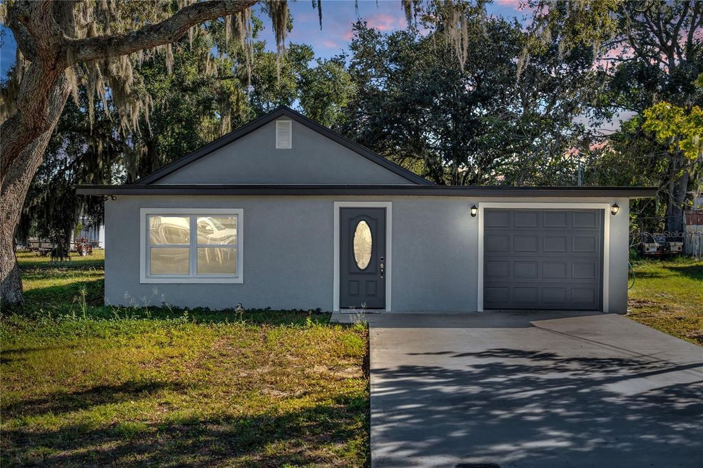 Photo of 1155 Wells Avenue, Tavares, FL 32778 (MLS # O6365275)