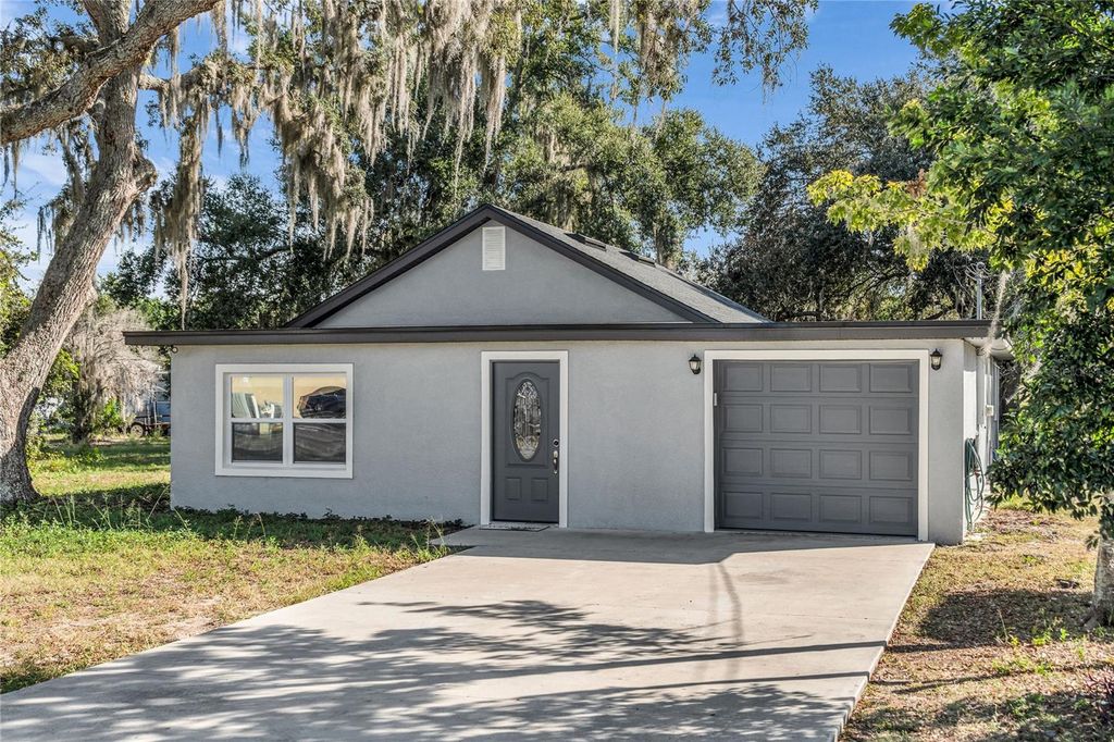 Photo of 1155 Wells Avenue, Tavares, FL 32778 (MLS # O6365275)